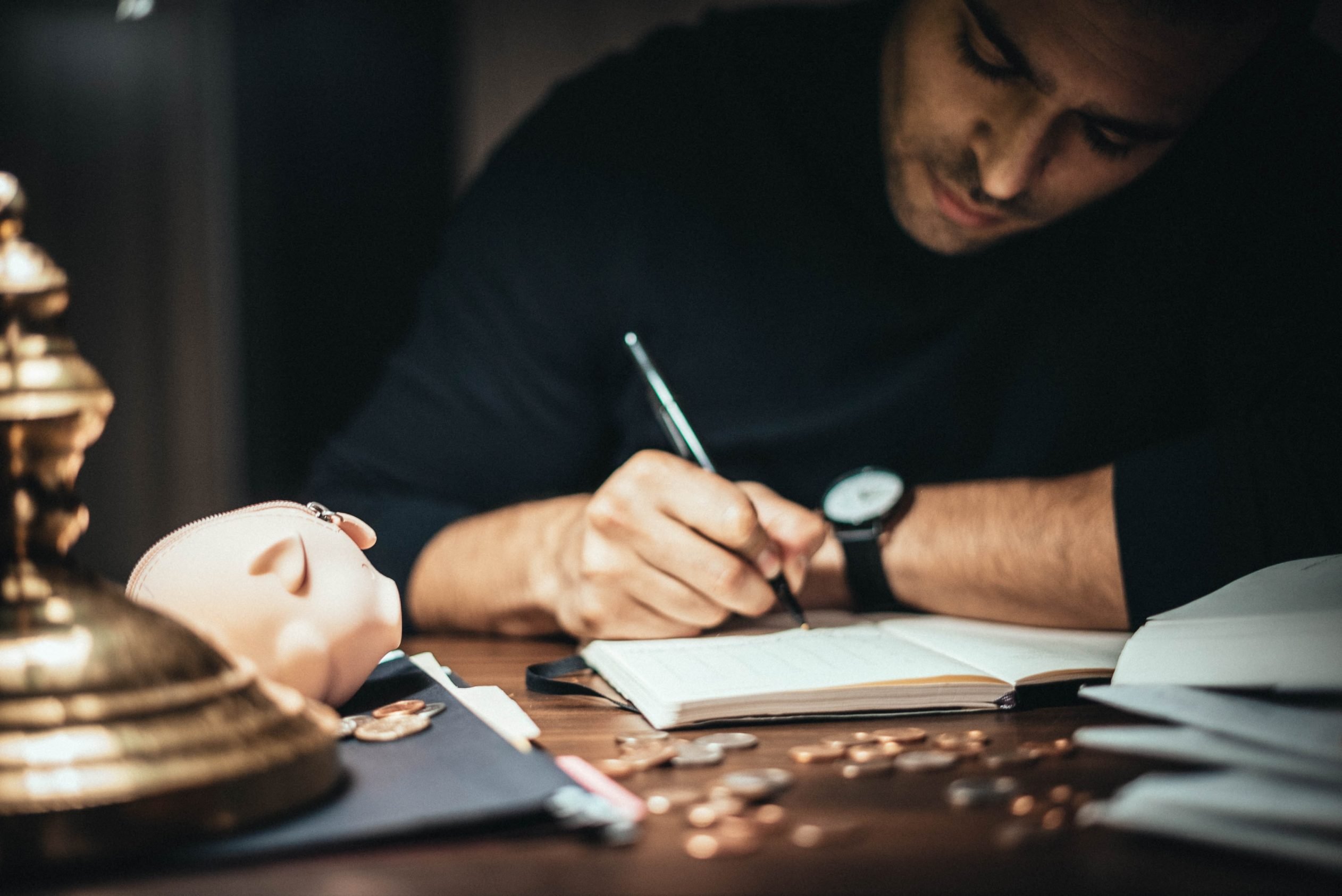 Man writing in journal